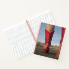 Low-angle view of woman wearing cowboy boots