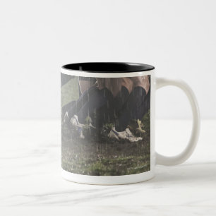 Lower section of rugby player in scrum, pushing Two-Tone coffee mug