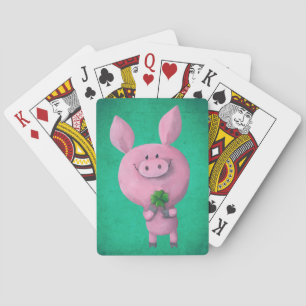 Lucky pig with lucky four leaf clover playing cards