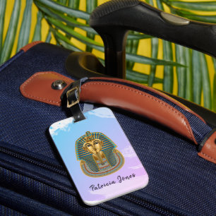 Luggage tag with a Tutankhamun mask illustration.