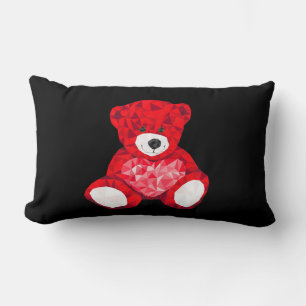 Lumbar pillow with red teddy bear in black.