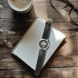 Luna Moth Moon Phases Black Watch<br><div class="desc">A vibrant green luna moth is surrounded by moon phases and lush green leaves against a deep black background.</div>