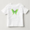 Luna moth on a pale green background