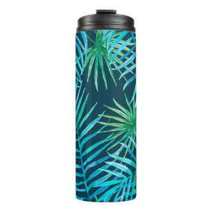 Lush greenery of tropical plants from jungle seaml thermal tumbler