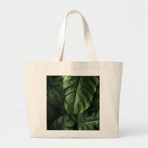 Lush Monstera Leaves with Morning Dew Drops Large Tote Bag