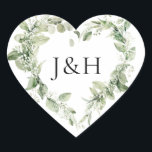 Lush White Flowers and Greenery Monogram Wedding Heart Sticker<br><div class="desc">Seal your wedding invitation envelopes or favours with our elegant floral wedding stickers featuring your monogram initials surrounded by a heart-shaped wreath of painted white gardenia flowers, sprigs of baby's breath, dahlias, sage green fern leaves, and vibrant green leaves. Designed to coordinate with our Lush White Flowers and Greenery collection....</div>