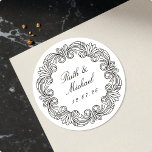 Luxurious Baroque Scroll Wedding Name & Date Classic Round Sticker<br><div class="desc">Enhance your event stationery and favours with these captivating custom stickers. This design features an exquisite circular border of ornate Baroque scrollwork, elegantly framing your personalised names and event date. These high-quality, peel-and-stick labels offer ultimate convenience, providing a polished and grand look in seconds for wedding seals, anniversary party favours,...</div>