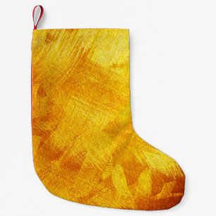 Luxurious golden texture, abstract background. small christmas stocking