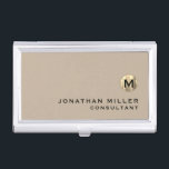 Luxury Gold Monogram Beige Business Card Holder<br><div class="desc">Simple modern design with luxury brushed metallic gold monogram medallion with personalised name and title or custom text below in classic block typography on a solid beige background. Personalise for your custom use.</div>