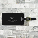 Luxury Minimal Monogram Black Ivory Chic Stylish Luggage Tag<br><div class="desc">Chic and stylish,  this modern monogram luggage tag in white and black is a sophisticated minimalist design that combines your monogram in a hand lettered script along elegant serif typography. On the back is space for your address.</div>
