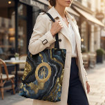 Luxury Navy Blue & Gold Agate Marble Monogram Tote Bag<br><div class="desc">Elevate your daily style with this sophisticated and artistic Navy Blue & Gold Agate Marble Monogram Tote Bag. This design features a mesmerizing abstract fluid art background that mimics the look of deep ocean waves, dark geode stone, and liquid marble. The rich palette of midnight navy, charcoal black, and swirling...</div>