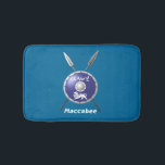 Maccabee Shield And Spears Bath Mat<br><div class="desc">A depiction of a Maccabee's shield and two spears. The shield is adorned by a lion and text reading "Yisrael" (Israel) in the Paleo-Hebrew alphabet. "Maccabee" also appears in English. The Maccabees were Jewish rebels who freed Judea from the yoke of the Seleucid Empire. Chanukkah is not just a mid-winter...</div>