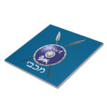 Maccabee Shield And Spears Tile<br><div class="desc">A depiction of a Maccabee's shield and two spears. The shield is adorned by a lion and text reading "Yisrael" (Israel) in the Paleo-Hebrew alphabet. "Maccabee" also appears in modern Hebrew. The Maccabees were Jewish rebels who freed Judea from the yoke of the Seleucid Empire. Chanukkah is not just a...</div>