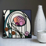 Mackintosh Art Deco Abstract Floral Wall Decor Cer Tile<br><div class="desc">This ceramic tile features bold geometric shapes and intricate floral patterns reminiscent of the iconic style of Mackintosh. He was a prominent Scottish architect, designer, and artist of the Art Nouveau movement. Clean lines, geometric shapes, and a strong sense of symmetry characterise his work. These elements are beautifully represented in...</div>