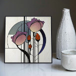 Mackintosh Art Deco Abstract Floral Wall Decor Tile<br><div class="desc">This ceramic tile features bold geometric shapes and intricate floral patterns reminiscent of the iconic style of Mackintosh. He was a prominent Scottish architect, designer, and artist of the Art Nouveau movement. Clean lines, geometric shapes, and a strong sense of symmetry characterise his work. These elements are beautifully represented in...</div>