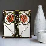 Mackintosh Art Deco Floral Glass Wall Decor Tile<br><div class="desc">This ceramic tile features bold geometric shapes and intricate floral patterns reminiscent of the iconic style of Mackintosh. He was a prominent Scottish architect, designer, and artist of the Art Nouveau movement. Clean lines, geometric shapes, and a strong sense of symmetry characterise his work. These elements are beautifully represented in...</div>