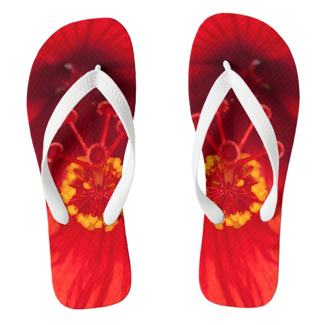 Macro photo of red hibiscus flower on flip flops (Footbed)