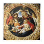 Madonna of the Magnificat Tile<br><div class="desc">Madonna of the Magnificat is a painting by the Italian Renaissance master Sandro Botticelli, 1487 FLorence Italy .tempera on panel.This work portrays the Virgin Mary crowned by two angels. The Child Jesus is keeping in a hand the pomegranate,  symbol of the Resurrection.</div>