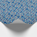 Magen David Swirl Blue and Silver Mosaic Wrapping Paper<br><div class="desc">Premium quality glossy wrapping paper featuring a beautiful and intriguing original design combining swirls in two shades of blue and a silvery effect "spooning" together to create an exaggerated knitted look, topped w/ silvery Stars of David (Magen David). Suitable for Hannukkah, Bar & Bat Mitzvahs, & most Jewish Life Events....</div>