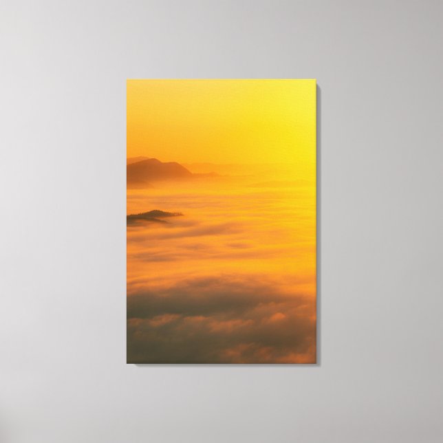 Magical autumn sunrise above clouds canvas print (Front)