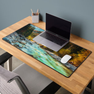 Magical river in autumn forest desk mat