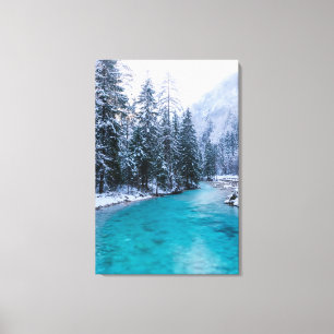 Magical river in enchanted winter forest canvas print
