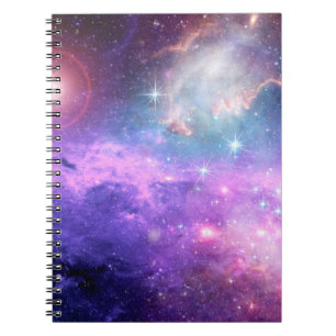Magical surreal colourful space background with ma notebook