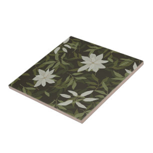 Magnolia and green leaves on black tile