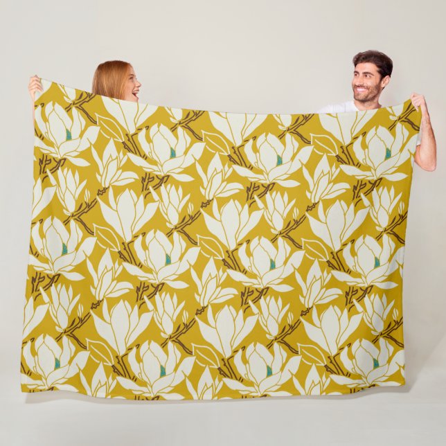 Magnolia graphic in mustard pattern fleece blanket (In Situ)