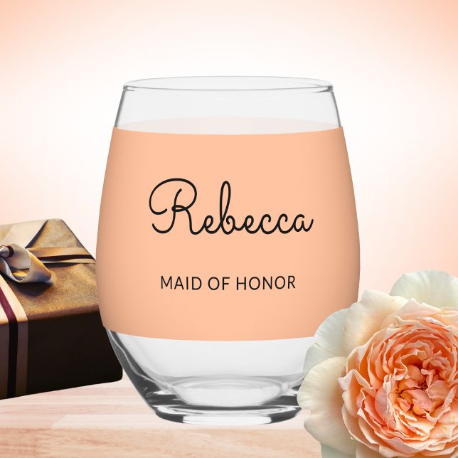 Maid of Honour Monogram Wedding Elegant Chic Peach Stemless Wine Glass (A pretty stemless wine glass with personalized name and 'Maid of Honor' words on a peach background)