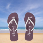 Maid of Honour Trendy Eggplant Colour Flip Flops<br><div class="desc">Gift your wedding bridesmaids with these stylish Maid of Honour flip flops that are a trendy eggplant colour along with white,  stylised script to complement your similar wedding colour scheme. Select foot size along with other options. You may customise your flip flops to change colour to your desire.</div>