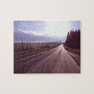 Main road with low winter sun. jigsaw puzzle