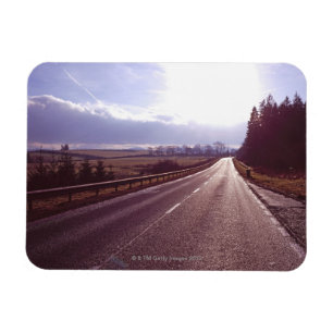 Main road with low winter sun. magnet