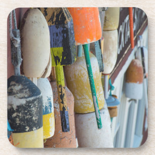 Maine, Bar Harbour. Colourful lobster trap buoys Coaster