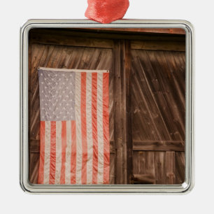 Maine, Faded American flag on door of old barn Metal Tree Decoration