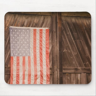 Maine, Faded American flag on door of old barn Mouse Mat