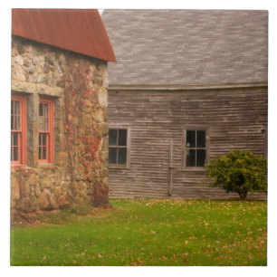 Maine,  Old stone building and wooden barn in Tile