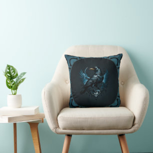 Majestic black raven sitting on an ornate cushion