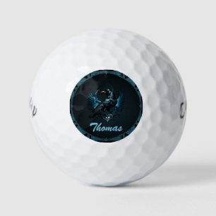 Majestic black raven sitting on an ornate golf balls