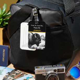 Majestic Buffalo Grazing Near Rugged Mountains Luggage Tag