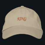 Majestic "King" Khaki Cotton Elegant Trucker Hat<br><div class="desc">Enhance your look with this khaki adjustable cap featuring "King" embroidery in gold. Made from soft cotton,  it combines comfort with a touch of royalty. Adjustable fit for all-day wear. Elevate your style with a classic statement piece.</div>