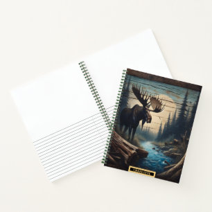 Majestic moose beside a tranquil river at dusk notebook