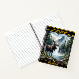 Majestic moose by a tranquil waterfall at dawn notebook