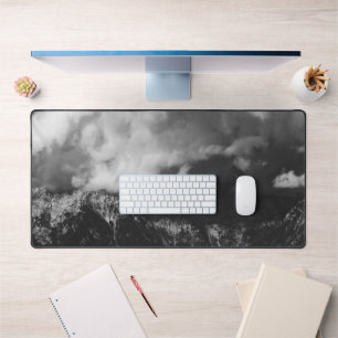 Majestic mountain underneath clouds desk mat