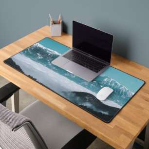 Majestic mountains rising over foggy valley desk mat