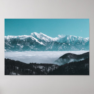 Majestic mountains rising over foggy valley poster