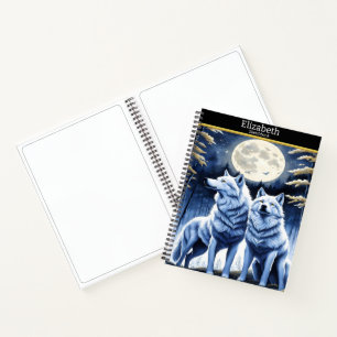 Majestic wolves howling under a luminous moonlight notebook