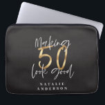 Making 50 look good gold birthday celebration laptop sleeve<br><div class="desc">Celebrate your 50th birthday in style with this black,  white and gold effect 50 and fabulous birthday design. A modern design with script text and bold graphics. Change the colour to customise. Part of a collection.</div>