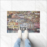 Malcesine at Lake Garda, Gustav Klimt Doormat<br><div class="desc">Gustav Klimt (July 14, 1862 – February 6, 1918) was an Austrian symbolist painter and one of the most prominent members of the Vienna Secession movement. Klimt is noted for his paintings, murals, sketches, and other objets d'art. In addition to his figurative works, which include allegories and portraits, he painted...</div>