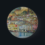 Malcesine on Lake Garda By Gustav Klimt 6 Cm Round Badge<br><div class="desc">Malcesine on Lake Garda (1913) by Gustav Klimt is a vintage Victorian Era Art Nouveau fine art symbolism painting. A beautiful view of the Italian city of Malcesine with buildings and houses on the edge of the harbour. The homes and boats cast a reflection in the calm water. You can...</div>